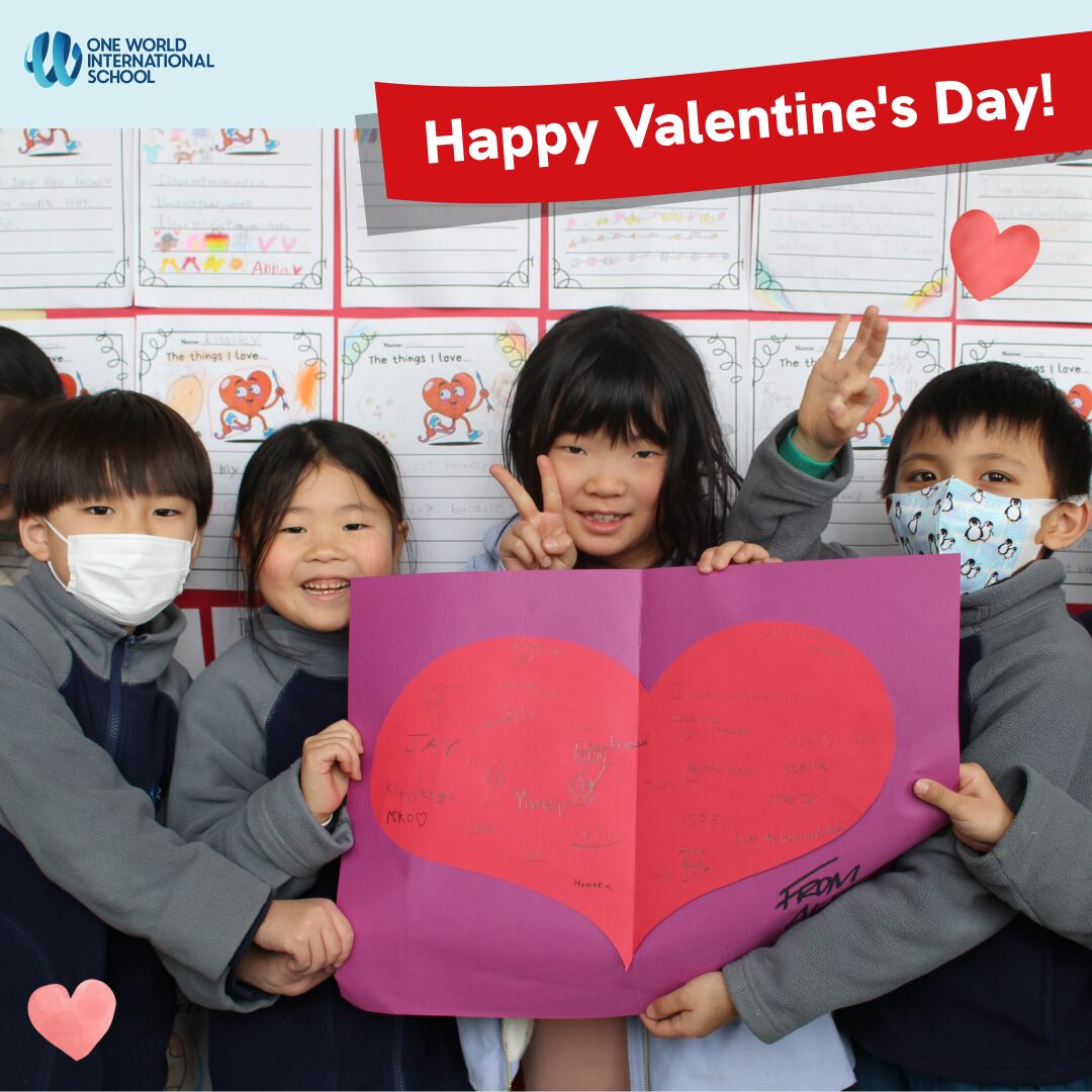 Learning about kindness during kindnes week. Kids make a big Heart and write the things they love on it during Valentine's Day class at One World International School Osaka