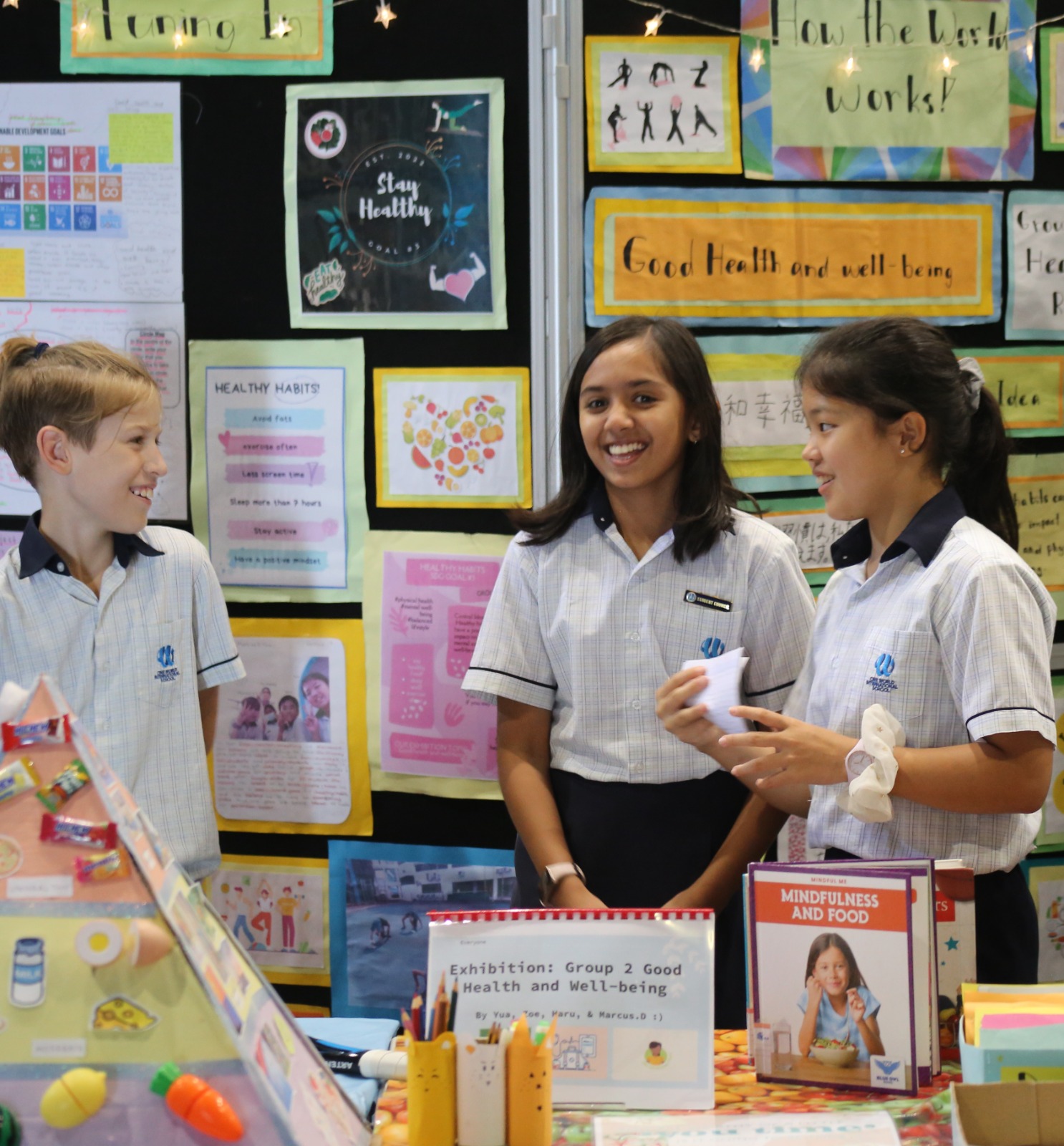 A glimpse of international school in Singapore students engrossed in a group discussion.